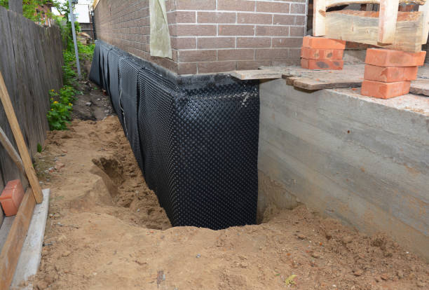 SJ Waterproofing Pros technician performing targeted Foundation Crack Repair assessment in Maynardville, TN